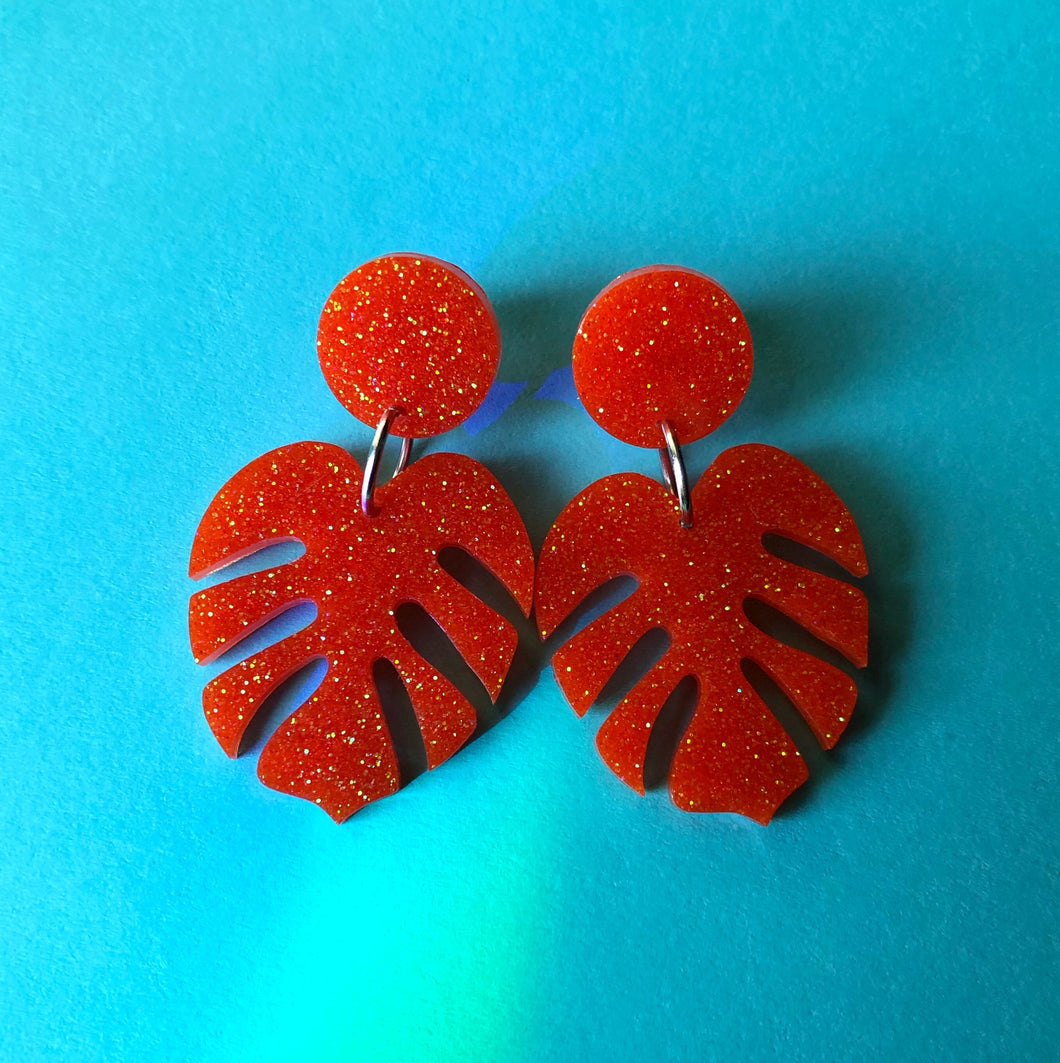 Glittery Orange Monstera Leaf Earrings